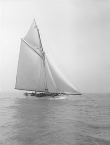 The cutter 'Grisette' sailing close-hauled, 1913. Creator: Kirk & Sons of Cowes.