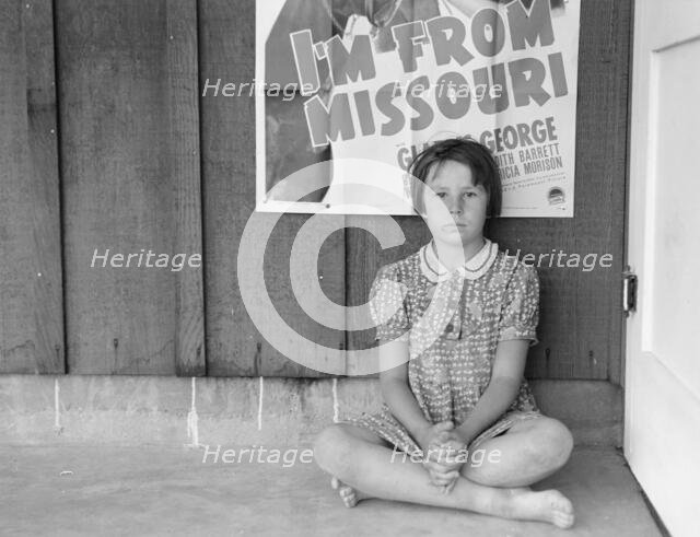 Advertisement for current movie in town, Westley, California, 1939. Creator: Dorothea Lange.