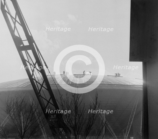 Construction workers on the roof of the Dome of Discovery, Festival of Britain, London, 1951. Artist: Henry Grant
