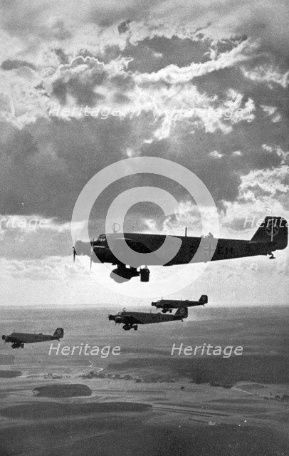 German Luftwaffe Junkers Ju 52 bombers flying over Nuremberg, Germany, 1936. Artist: Unknown