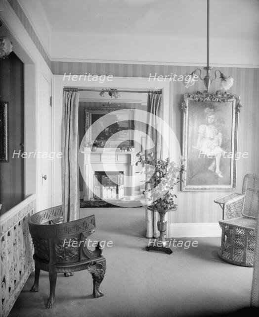 Room with painting of child, roses, and portiere, between 1900 and 1915. Creator: Unknown.