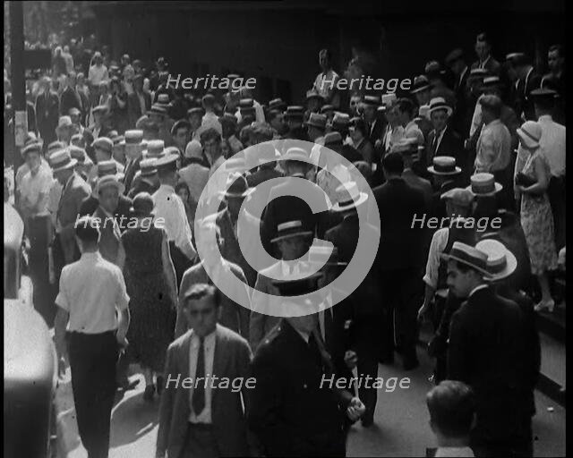 People Walking Around on a Crowded Street, 1930s. Creator: British Pathe Ltd.