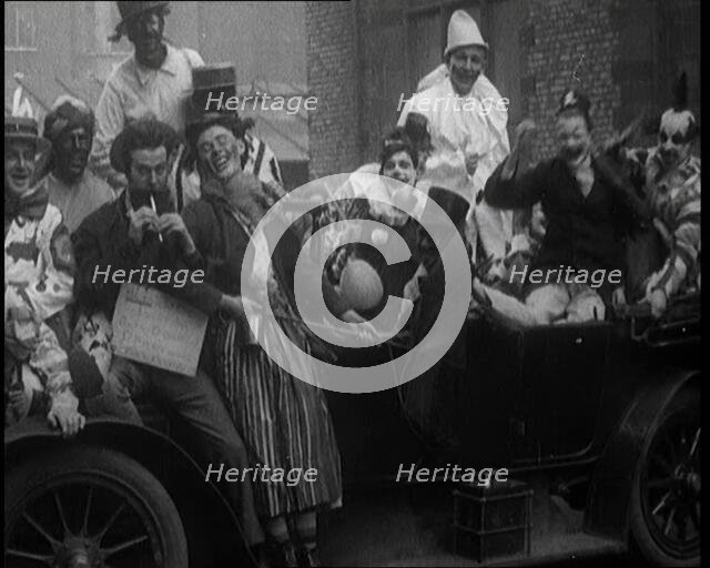 British Students in Fancy Dress Costumes Playing About at a Rag Event, 1920. Creator: British Pathe Ltd.