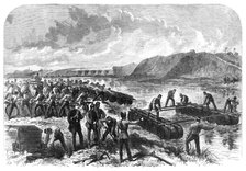 The Volunteer Review at Portsmouth: the 1st Hants Engineer Volunteers constructing a...bridge, 1868. Creator: Unknown.
