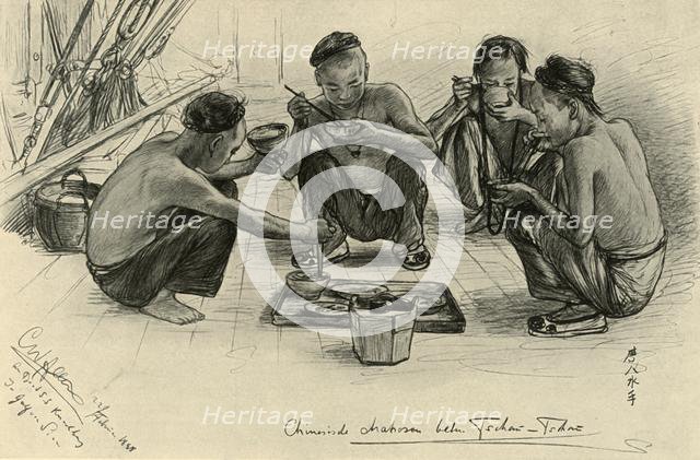 Chinese crew members eating on board the 'Knivsberg', 1898.  Creator: Christian Wilhelm Allers.