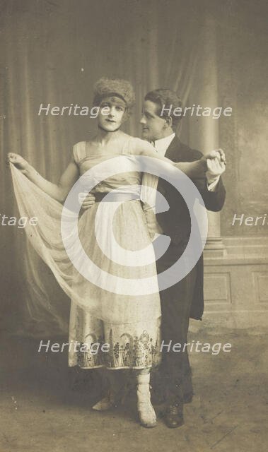 Two actors, one in drag, dancing together on stage, 1918. Creator: Unknown.