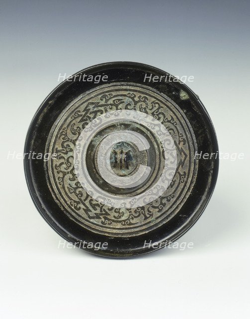 Bronze mirror with kui dragon pattern, Western Han dynasty, China, 2nd century BC. Artist: Unknown