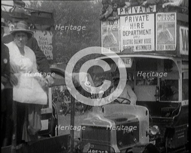 Cars, Buses and Pedestrians Arriving for the 1920 Epsom Derby, 1920. Creator: British Pathe Ltd.