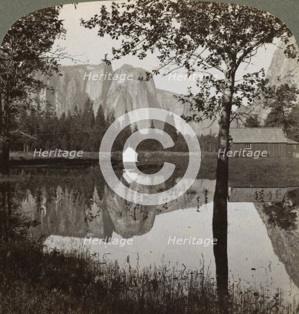 Mirror view of Cathedral Rocks, Yosemite Valley, California, USA, 1902.  Artist: Underwood & Underwood