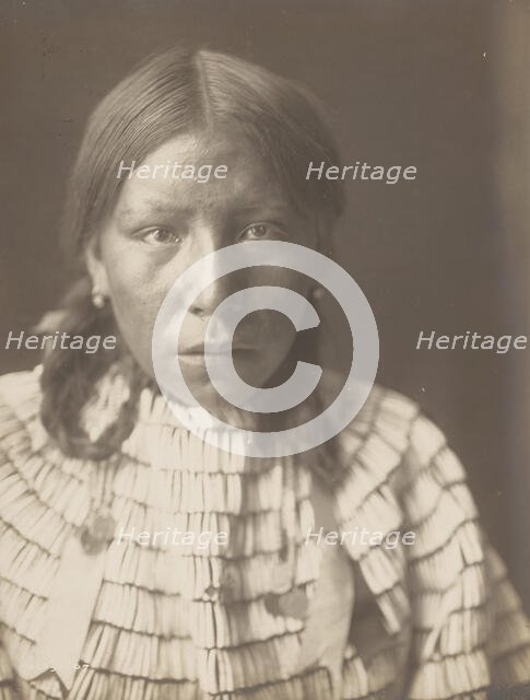 Big Road's daughter, 1907. Creator: Edward Sheriff Curtis.