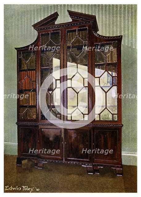 Carved Chippendale library bookcase, 1911-1912.Artist: Edwin Foley