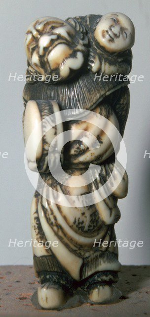 Japanese Netsuke of a Chinese dancer and child, 18th century.  Artist: Masahira