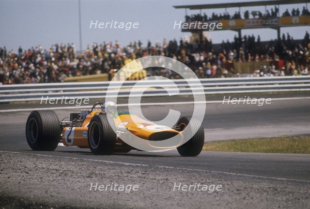 Bruce McLaren's McLaren-Ford, Spanish Grand Prix, Jarama, Madrid, 1968. Artist: Unknown