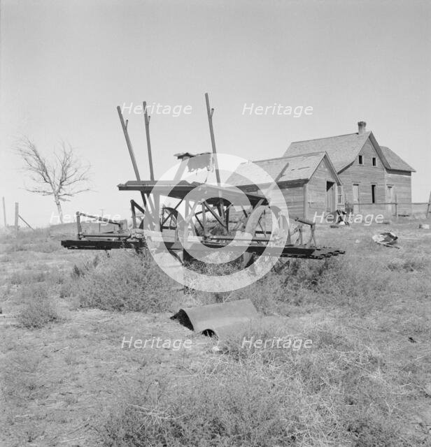 Farm machinery left on abandoned dry land farm in Columbia Basin, Grant County, Washington, 1939. Creator: Dorothea Lange.