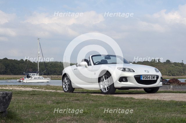 2014 Mazda MX5 Roadster Coupe Artist: Unknown.