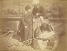 Group Portrait of Two Occidental Men and a Boy on a Boat in the Nile River, 1865. Creator: Théodule Deveria.