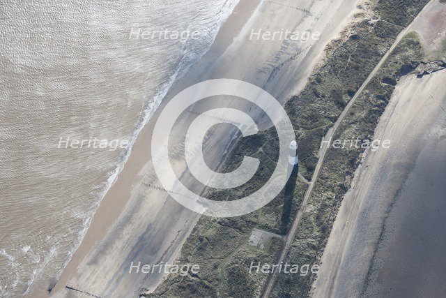 Disused lighthouse and remains of the coastal battery, Spurn Point, East Riding of Yorkshire, 2014.. Creator: Historic England Staff Photographer.
