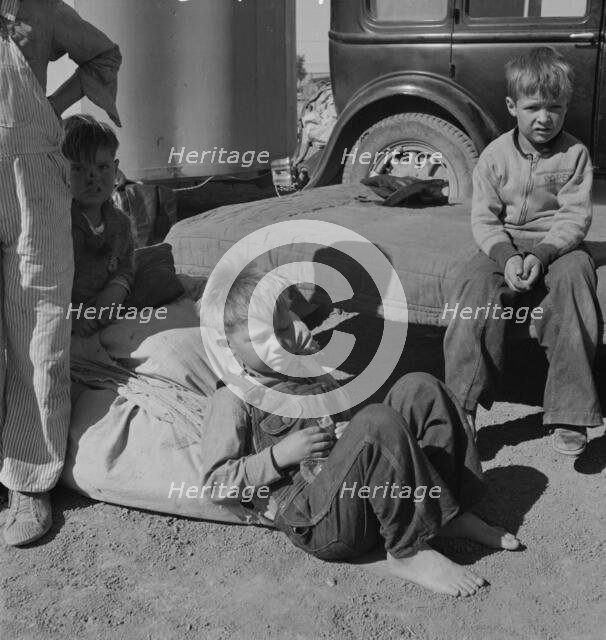 Children of Oklahoma migrants, near Calipatria, California, 1937. Creator: Dorothea Lange.