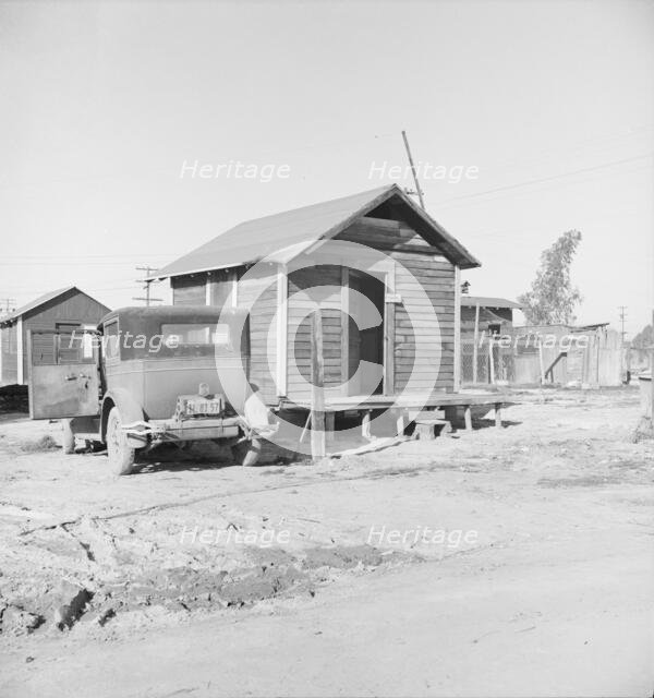 Newly-built cabins, rent five dollars per month, near Bakersfield, California , 1939. Creator: Dorothea Lange.