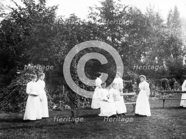 Girls on the Social Block lawn, York,Yorkshire, 1907. Artist: Unknown