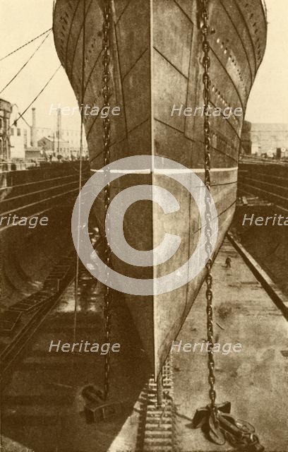 'The "Mauretania" in Dry Dock', c1930. Creator: H. Aslin.