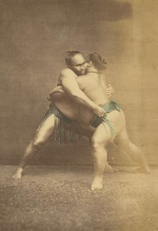 Two Japanese sumo westlers in gappling pose, 1868-1880. Creator: Felice Beato.