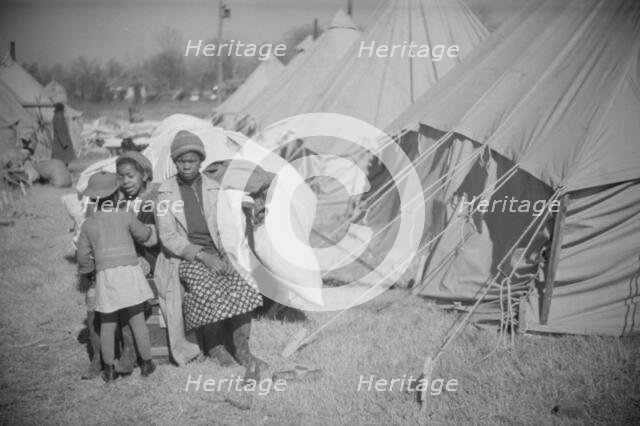 Possibly: Flood refugee encampment at Forrest City, Arkansas, ca. 1937. Creator: Walker Evans.