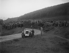 Vauxhall 30-98 of Humphrey Cook off the road at the Caerphilly Hillclimb, Wales, 1922. Artist: Bill Brunell.