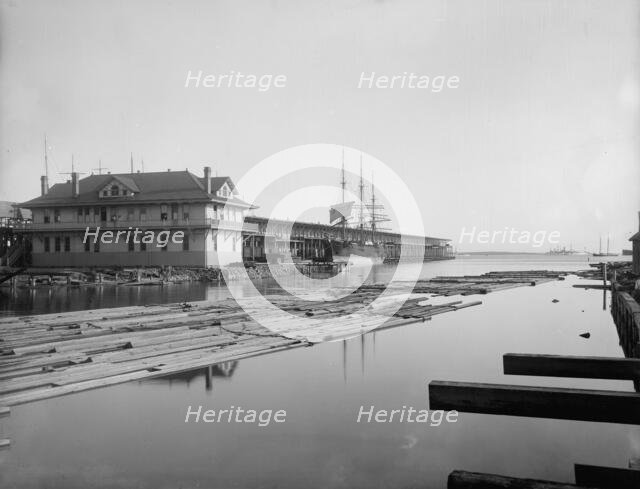 Wharf office and Commandancia Street wharf, Pensacola, Fla., between 1900 and 1905. Creator: Unknown.