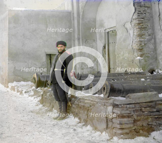 Sentry at the palace, and old cannons, Bukhara, between 1905 and 1915. Creator: Sergey Mikhaylovich Prokudin-Gorsky.
