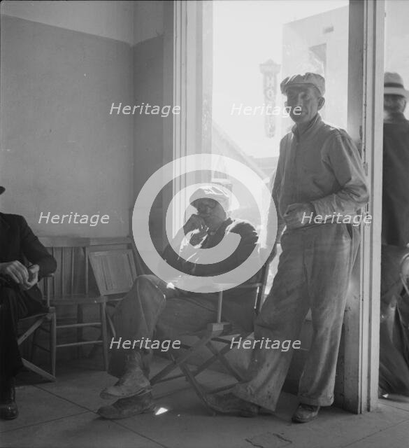 Waiting for the relief checks at Calipatria, California, 1937. Creator: Dorothea Lange.