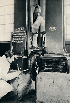 'An Impact Test in the Dunlop Test House', 1937. Artist: Unknown.