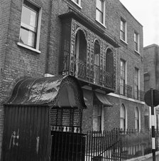 Wooden verandah, Camden Town, London, 1955-1965.  Artist: John Gay
