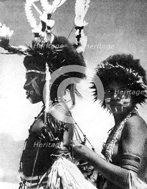 Painted warriors, Papua, New Guinea, 1936.Artist: Sport & General