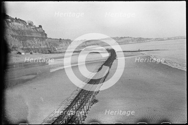 View looking north-east from Shanklin Beach, showing Admiralty scaffolding, Isle Of Wight, 1945. Creator: George R Long.