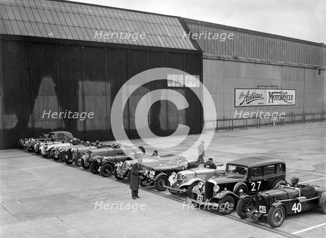 Cars on the start line at the JCC Members' Day, Brooklands, 8 July 1939. Artist: Bill Brunell.