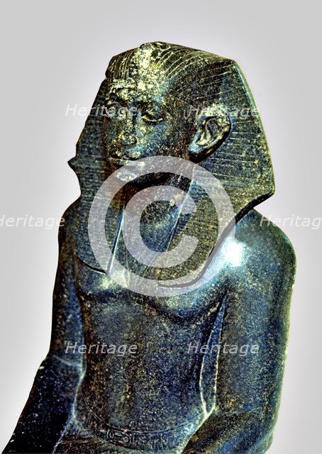 Seated statue of Sesostris III depicted as a young man, made in diorite, detail of the top, comes…