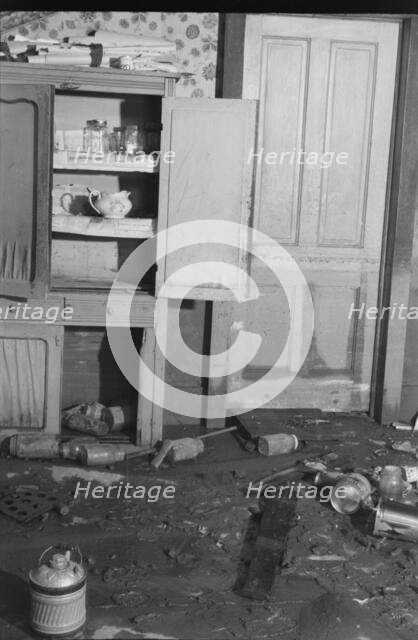 Interior of a farmhouse near Ridgeley, Tennessee, after the 1937 flood waters had subsided, 1937. Creator: Walker Evans.