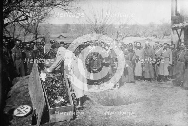 Burying soldier who cut barbed wire defence of Adrianople, 1913. Creator: Bain News Service.
