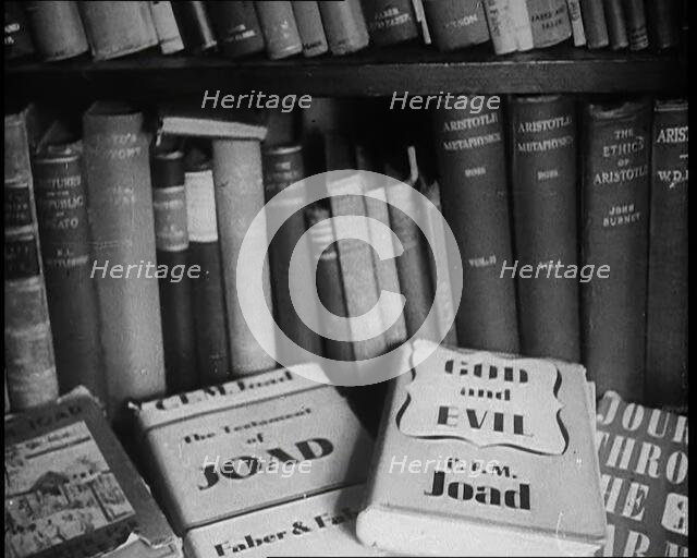 Books on a Bookshelf, 1930s. Creator: British Pathe Ltd.