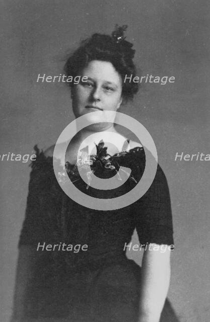 Mrs. Crabbe, half-length portrait, standing, facing front, between c1890 and 1910. Creator: Frances Benjamin Johnston.