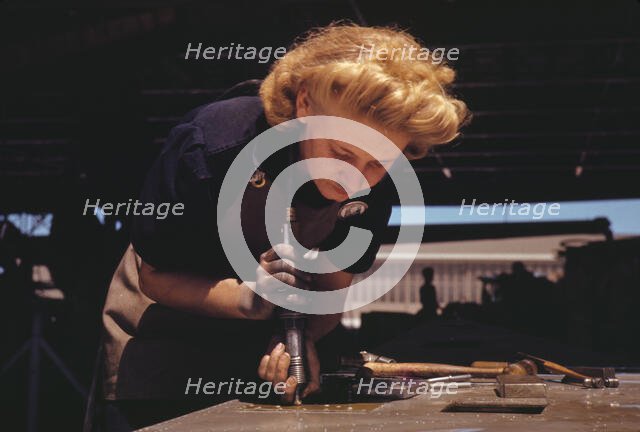 Working in the Assembly and Repair Dept. of the Naval Air Base, Corpus Christi, Texas, 1942. Creator: Howard Hollem.