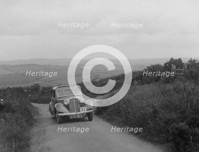 Talbot 10 of LF Phillipson competing in the MCC Torquay Rally, 1938. Artist: Bill Brunell.