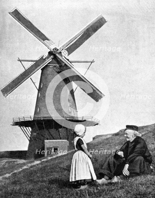 Traditional Dutch scene with windmill, Holland, 1936. Artist: Donald McLeish