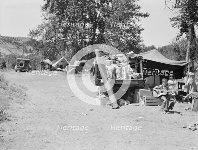 Possibly: Camp of migratory families in "Ramblers Park",  Yakima Valley, Washington, 1939. Creator: Dorothea Lange.