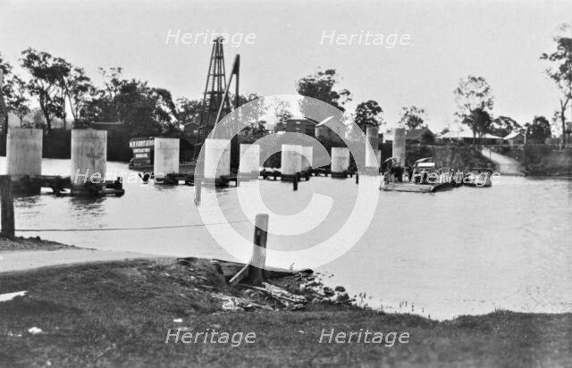 Coomera River Ferry and construction of the road bridge, 1929. Creator: Jack Bain.