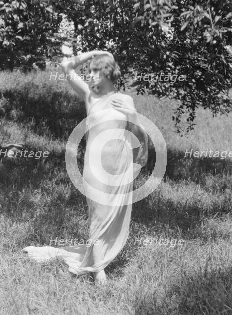 Olson, Margaret, Miss, standing outdoors, 1924 July. Creator: Arnold Genthe.