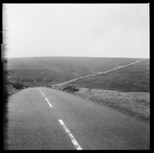 B3212 road, Challacombe Cross, Dartmoor, Devon, 1967. Creator: Eileen Deste.