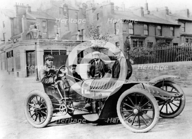 Herbert Austin behind the wheel of a Wolseley, Gordon Bennett Cup eliminating trials, 1904. Creator: Unknown.