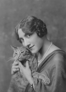 Liebert, M., Miss, with Buzzer the cat, portrait photograph, between 1916 and 1927. Creator: Arnold Genthe.